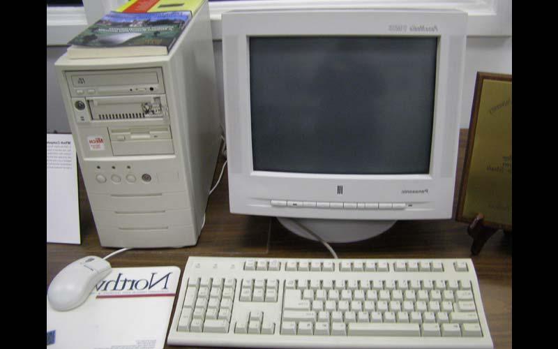 MTECH Computer (1997) | Northwest purchased 2,000 MTECH computers in 1997 and placed one each residence hall room. They had a removable hard drive, which made maintenance easy and relatively hassle-free due to the standardized loadset. (Courtesy of the Jean Jennings Bartik Computing Museum)